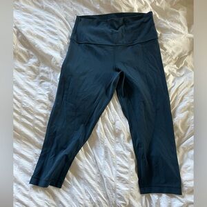 Cropped Lululemon leggings. Navy blue, like new. Size 8.